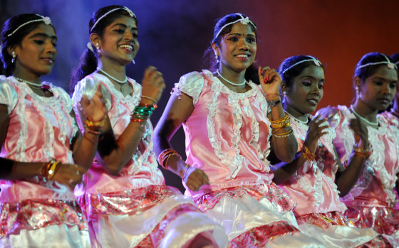 Sri Lankan former Tamil Tiger dancers perform during an official ceremony for former Tamil Tiger rebels in Colombo on March 29. The program to release nearly 400 former combatants to their families. Officials said more than 10,000 ex-combatants have been rehabilitated and released to their families since the war ended in May 2009.