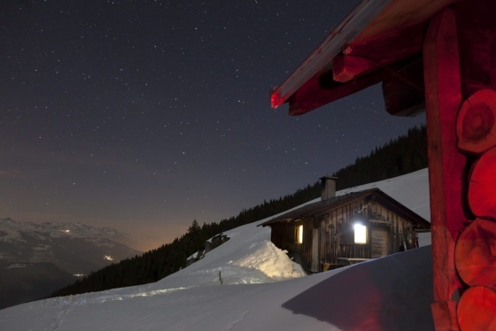 Moon and starlight shines over the snowy Alp Zavragia near Obersaxen in the Swiss canton of Grisons, Switzerland, March 29.