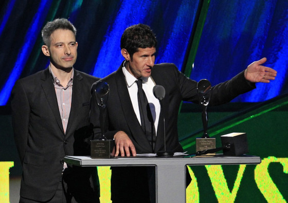 Adam Horovitz, left, and Mike Diamond of the Beastie Boys accept induction into the Rock and Roll Hall of Fame on April 14, 2012, in Cleveland. Fellow band member Adam Yauch, who died on Friday, was unable to attend.