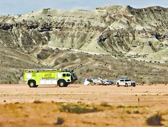 Emergency officials respond to a fatal plane crash near the St. George Municipal Airport on Saturday.