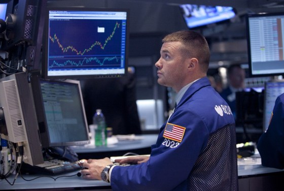 A trader works on the floor of the New York Stock Exchange.