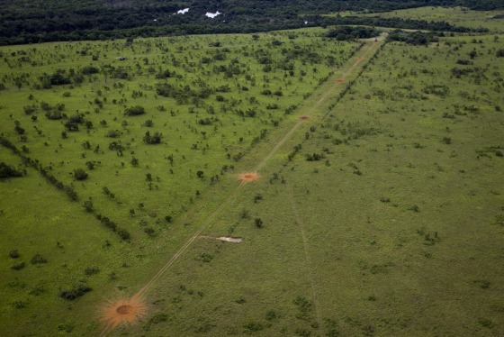 An aerial view shows a clandestine airstrip used for drug smuggling after it was destroyed in a military operation, approximately 22 miles from the border with Colombia, in the state of Apure on Thursday.
