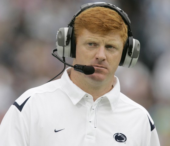 Assistant coach Mike McQueary of the Penn State Nittany Lions walks the sidelines in State College, Pa., Sept. 12, 2009.