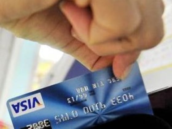 The lawsuit alleges MasterCard and Visa conspired with some of the largest banks in the country to set the swipe fee a merchant must pay every time a customer uses their credit card.