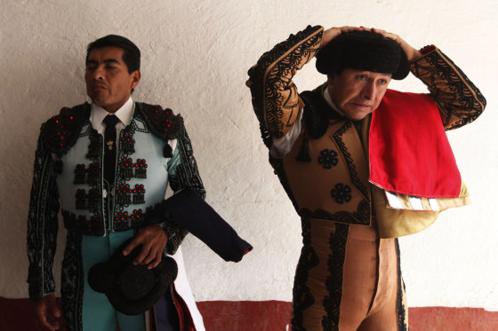 A Mexican banderillero adjusts his montera before the start of a bullfight at La Mexico bullring in Mexico City, Sept. 16, 2012.