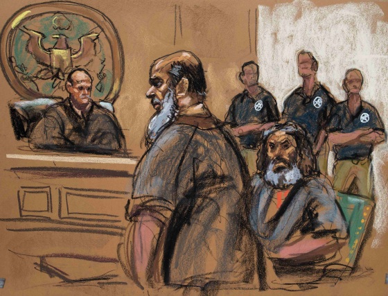 Terror suspects Khaled al Fawwaz, center, and Adel Abdel Bary are seen in this courtroom sketch during an appearance in Manhattan Federal Court on Saturday.