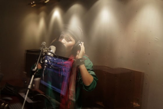 Afghanistan's first female rapper Sosan Firooz sings in a studio in Kabul.