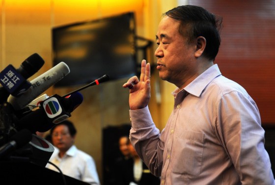 Nobel Prize-winning writer Mo Yan holds a press conference in his hometown of Gaomi,in China's Shandong province, on Friday.