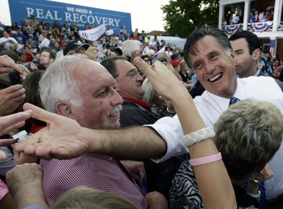 Republican presidential candidate and former Massachusetts Gov. Mitt Romney campaigns in front of The Golden Lamb Inn and Restaurant in Lebanon, Ohio, Saturday, Oct. 13, 2012.
