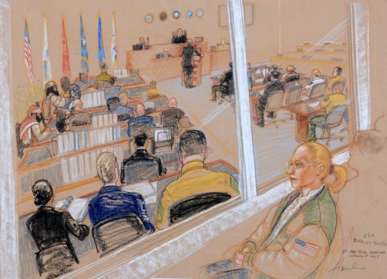 Merrilly Noeth, a relative of a victim of the Sept. 11 attacks, is pictured watching from behind sound-proof glass on the second day of the Military Commissions pretrial hearing for the five men accused of planning the attacks, at Guantanamo Bay U.S. Naval Base in Cuba, on Tuesday. Only two of five suspects were present in the second day of the proceedings--Yemenis Walid bin Attash and Ramzi Binalshibh.