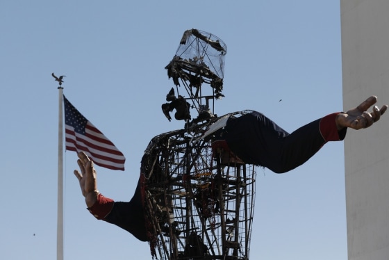 The burned remains of Big Tex stand at the State Fair of Texas on Friday in Dallas.