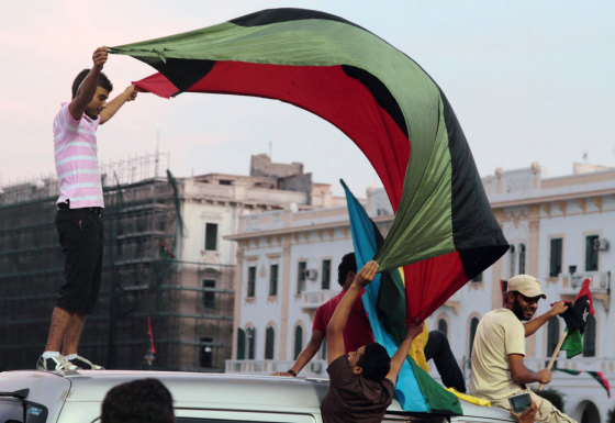 Libyans celebrate one year since the country declared liberation from former dictator Muammar Gaddafi, at Martyrs Square in Tripoli, Libya, Oct. 23, 2012.