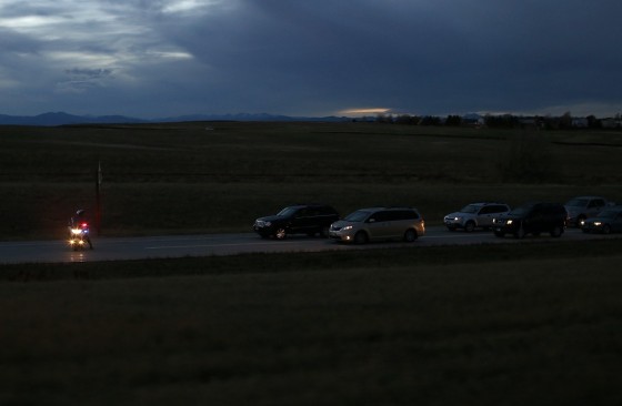 A motorcycle police officer blocks an on ramp as Mitt Romney's motorcade passes by on October 23, 2012 in Denver, Colorado.