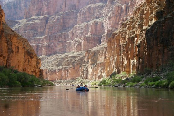 Boaters travel down the Colorado River in Grand Canyon National Park.