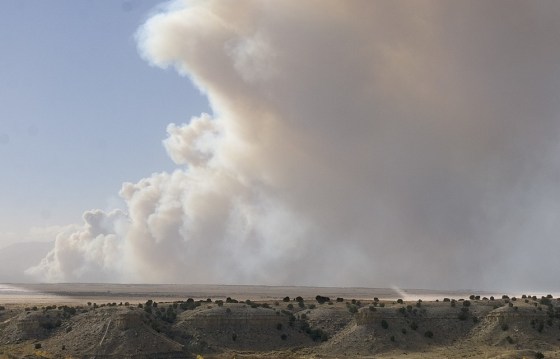 Smoke billows from a wildfire near Wetmore, Colo., on Tuesday.