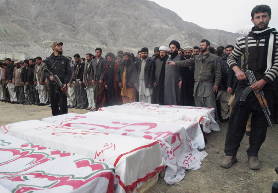 Pakistan Shiite Muslims offer prayers during a funeral for community members killed in an ambush in the northern town of Gilgit on Feb. 29.