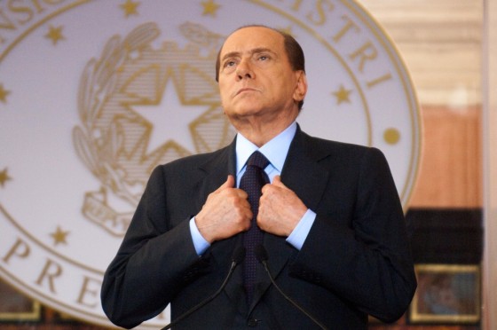 Former Italian Prime Minister Silvio Berlusconi, shown here in April 2011, was sentenced Friday to four years in prison.
