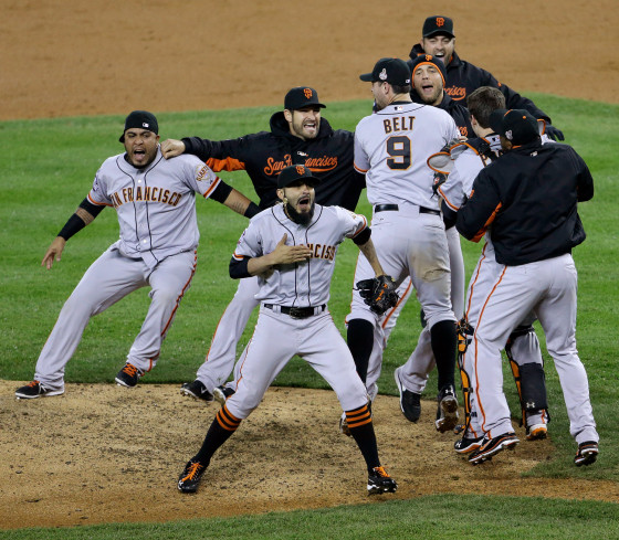 San Francisco Giants' Sergio Romo and teammates celebrate after defeating the Detroit Tigers, 4-3, in Game 4 of baseball's World Series, Oct. 28, in Detroit, Mich. The Giants won the series.