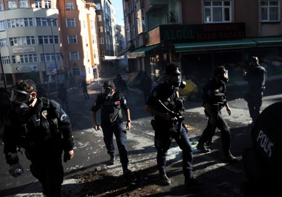 Turkish riot police take positions as they clash with Kurdish demonstrators during a protest in support of a hunger strike movement by Kurdish prisoners in Istanbul, Turkey, Oct. 30.