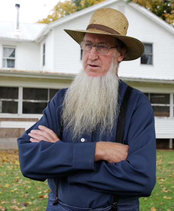 In this file photo, Amish bishop Sam Mullet is seen outside his home in Bergholz, Ohio, on Oct. 10, 2011.