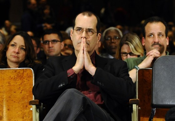 David Wheeler, father of Sandy Hook School shooting victim Benjamin, listens to a legislative hearing of a task force on gun violence and children's safety at Newtown High School in Newtown, Conn., on Jan. 30, 2013.