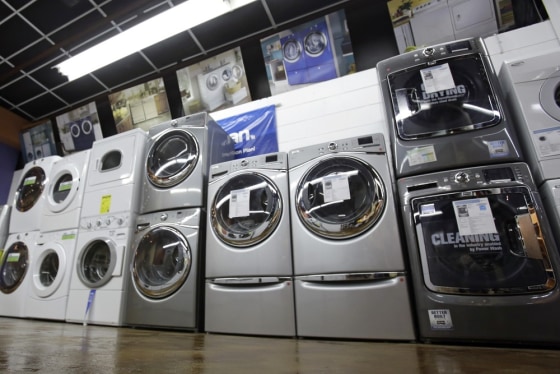 In this Tuesday, Jan. 8, 2013 photo, washers and dryers are displayed at an Aggressive Appliances store in Orlando, Fla.