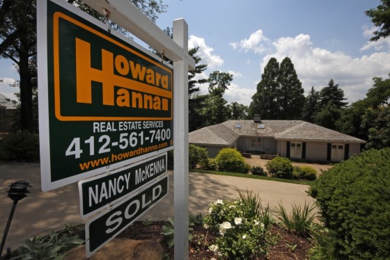 Interest rates are up, so contracts to buy existing homes are down, raising more worries about the housing recovery.