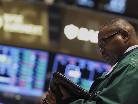 Wall Street remains a hard place for blacks to get ahead. Here, a trader works on the floor of the New York Stock Exchange on Monday.