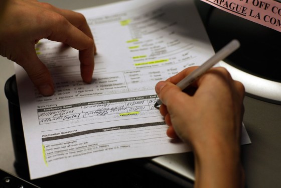 About 1.3 million unemployed Americans face the loss of jobless benefits in the New Year if Congress doesn't move quickly to extend them. Above, an unemployed worker fills out a benefits form.