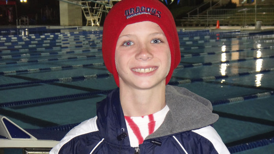 Swimming champ, 9, gives trophy to hospitalized rival