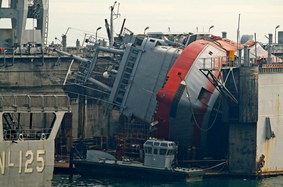 A picture made avaliable on December 24 shows a general view of Turkish navy boat after an accident in Izmir, Turkey. Ten people died when a Turkish navy tug boat capsized in near the port city of Izmir, news reports said. Another 17 people were injured when the boat capsized after being released from a navy shipyard where it had undergone repairs, the news agency Anadolu said. The cause of the tug boat to capsize was unknown. An investigation was under way.