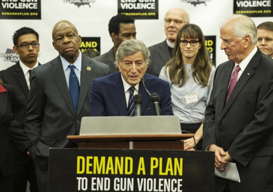 Tony Bennett spoke during a press conference by Mayors Against Illegal Guns on Wednesday in Washington, DC, as representative Elijah Cummings (D-MD), Chris Rock, Rev Timothy A. Boggs (right) and Amanda Peet look on.