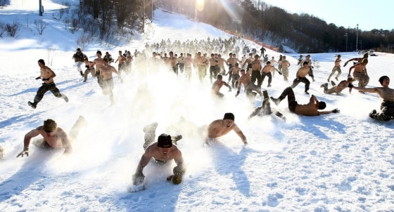 U.S. Marines and South Korean Marine Corps soldiers perform in the snow during a winter exercise in Pyeongchang on Feb. 7, 2013.