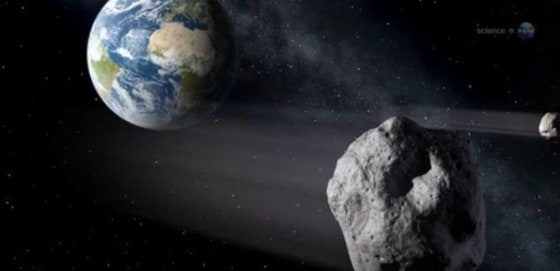 An asteroid zooms past the Earth in this artist's impression -- but how many space rocks are captured by Earth's gravity?