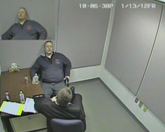 Naval intelligence officer Jeffrey Delisle is shown in this still image taken from video of the Royal Canadian Mounted Police videotaped interrogation of the confessed spy in Lower Sackville, Nova Scotia on Jan.13, 2012. Delisle found himself facing Mountie Jim Moffatt at the RCMP detachment after he was arrested following the interception days earlier of attempted transmissions to the Russians.