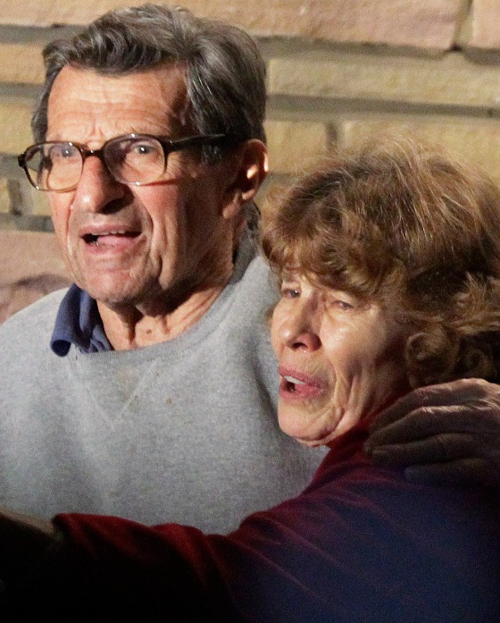 Joe Paterno and his wife Susan stand on their porch to thank well-wishers gathered outside in State College, Pa., Wednesday, Nov. 9, 2011.
