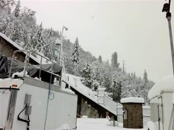 This 2011 image provided by the National Oceanic and Atmospheric Administration shows a field survey site in California's Sierra Nevada mountains. A new study published Thursday found snowfall in the Sierras was influenced by dust and microbes from as far away as Africa.