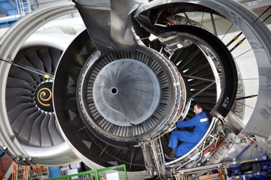 A technician works on the engine of an Airbus A380 airplane on January 28 at the maintenance hall of German airline Lufthansa in Frankfurt am Main, western Germany.
