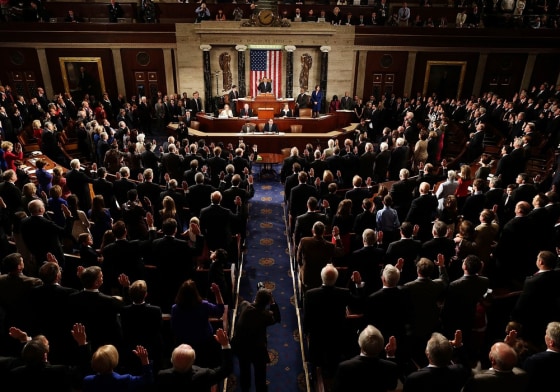 House Speaker John Boehner, R-Ohio, swears in the newly elected members of the first session of the 113th Congress in the House Chambers January 3, 2013.