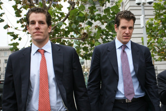 Picture taken on January 11, 2011 shows Cameron (L) and Tyler (R) Winklevoss, founders of social networking website ConnectU, leaving the US Court of ...