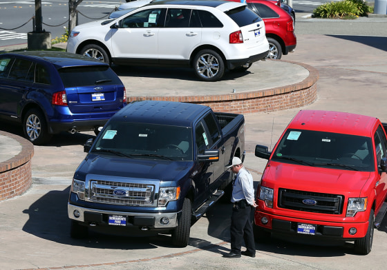 COLMA, CA - MAY 01: New Ford trucks and cars are displayed on the sales lot at Serramonte Ford on May 1, 2013 in Colma, California. Ford Motor Co. r...