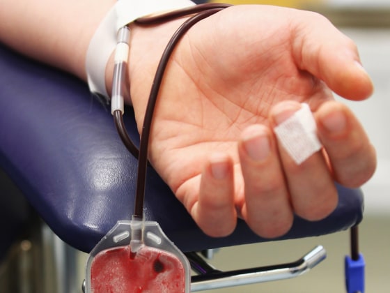 HARBURG, GERMANY - JUNE 08: A woman donates blood at the blood donation service Hamburg on June 8, 2011 in Harburg, Germany. Hospitals and the Red Cr...