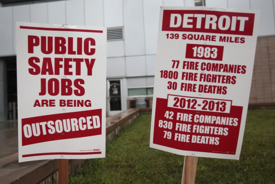 Informational signs are seen in front of a southwest Detroit neighborhood Fire House placed there by Detroit firefighters to inform the public about t...