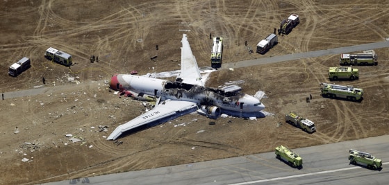 The wreckage of Asiana Flight 214 at the San Francisco International Airport on July 6.
