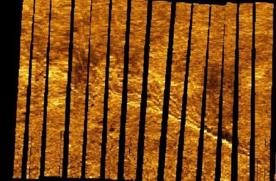 This is the corrected imagery of the anomaly. The straight line against the sea floor suggests a manmade object, which has similar dimensions to Earhart's plane.