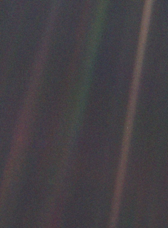 NASA's Voyager 1 spacecraft made this image of Earth -- the dot at center right -- when it was 4 billion miles away. The image was requested by Carl Sagan, who died on Dec. 20, 1996.