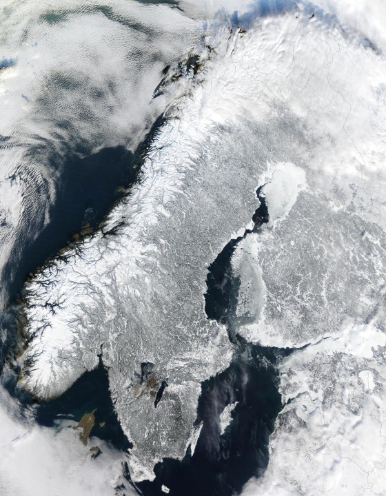 The Scandinavian Peninsula is dusted with snow in this satellite view, captured by NASA's Terra spacecraft on Feb. 19, 2003.