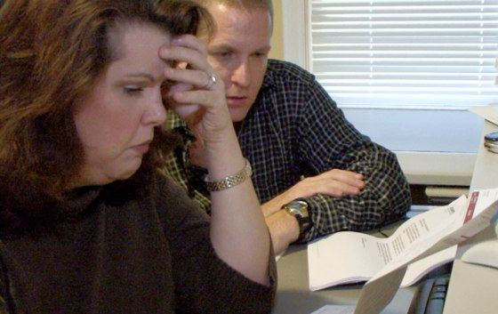 Royal Oak, Michigan -- 10/13/09 -- Kevin and Michele Thomas at their home. Unemployed and uninsured Michele needed emergency gall bladder surgery rece...