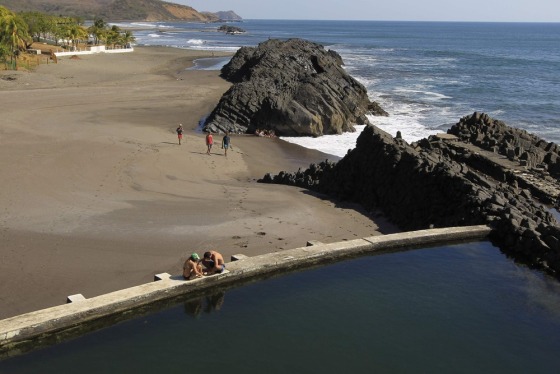 Tourist sunbathe at the El Transito beach along the Nicaraguan Pacific Coast, February 16, 2013.