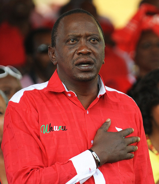 Kenya's Deputy Prime Minister and presidential candidate Uhuru Kenyatta singing the national anthem during an electoral rally on March 2, 2013 in Nairobi on the last day of campaigning.
